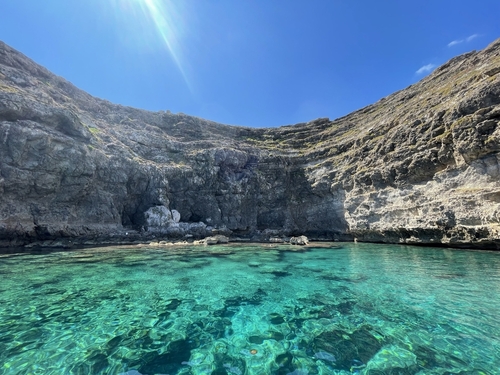 discovering,tranquility,in,a,secluded,cove,on,italy's,lampedusa,island,